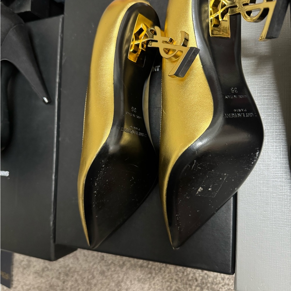 Saint Laurent Gold Leather Opyum 85. - Picture 3 of 7